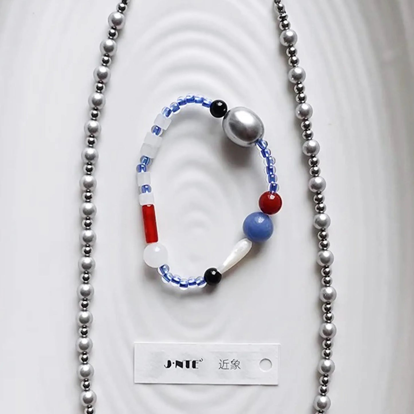 Klein Blue Bead Bracelet