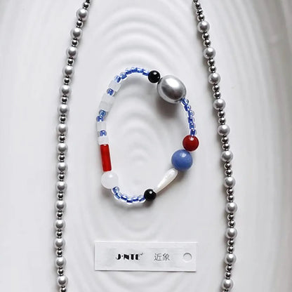Klein Blue Bead Bracelet